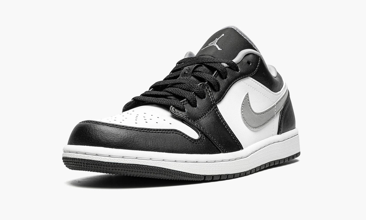 "Black / Particle Grey" Air Jordan 1 Low Sneakers - product image from the listing.