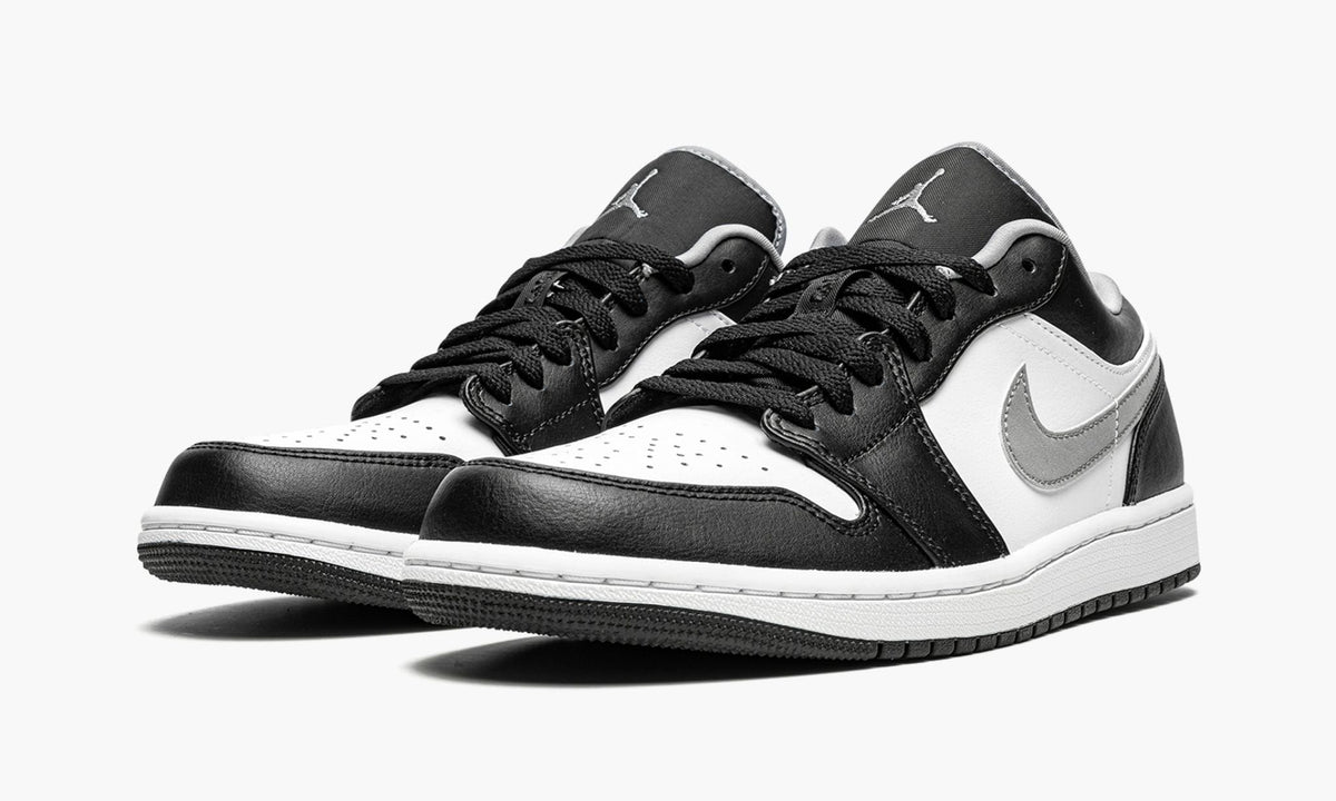 "Black / Particle Grey" Air Jordan 1 Low Sneakers - product image from the listing.