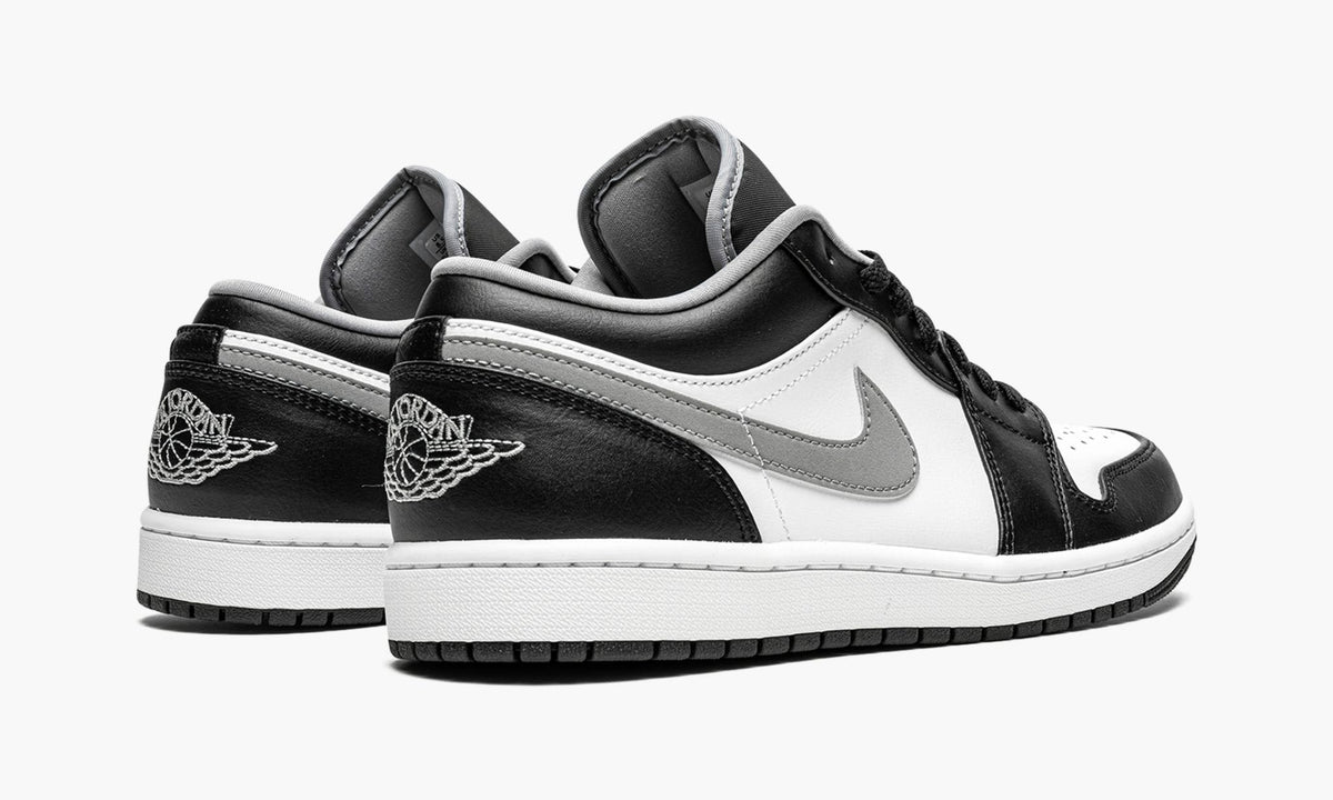 "Black / Particle Grey" Air Jordan 1 Low Sneakers - product image from the listing.