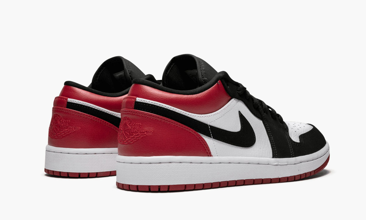 "Black Toe" Air Jordan 1 Low Sneakers - product image from the listing.