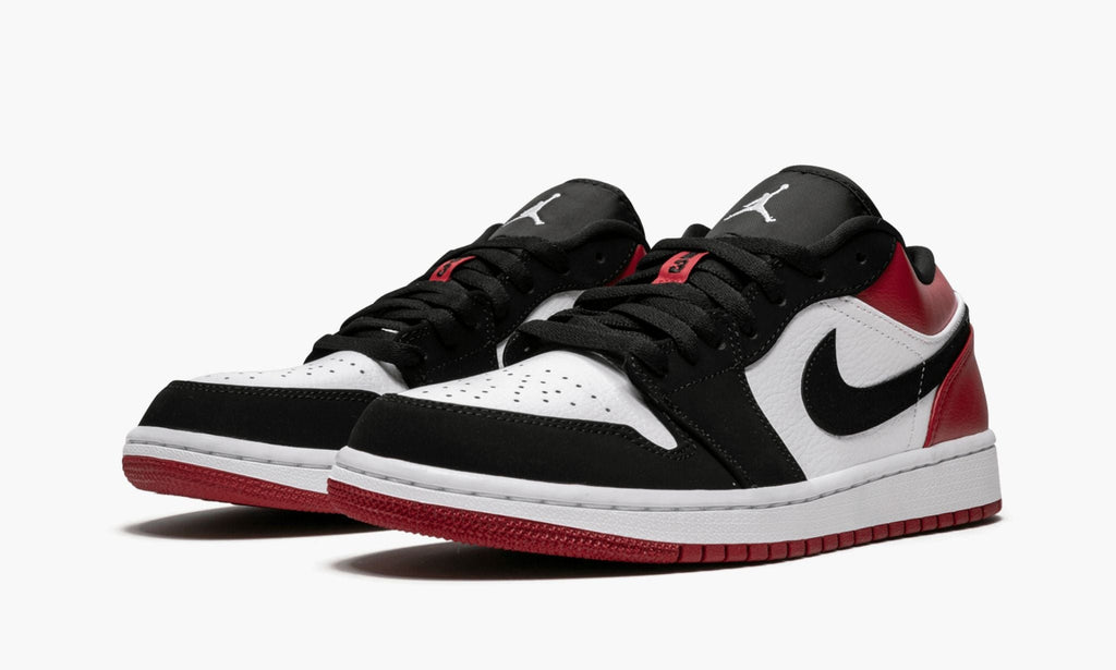 "Black Toe" Air Jordan 1 Low Sneakers - product image from the listing.