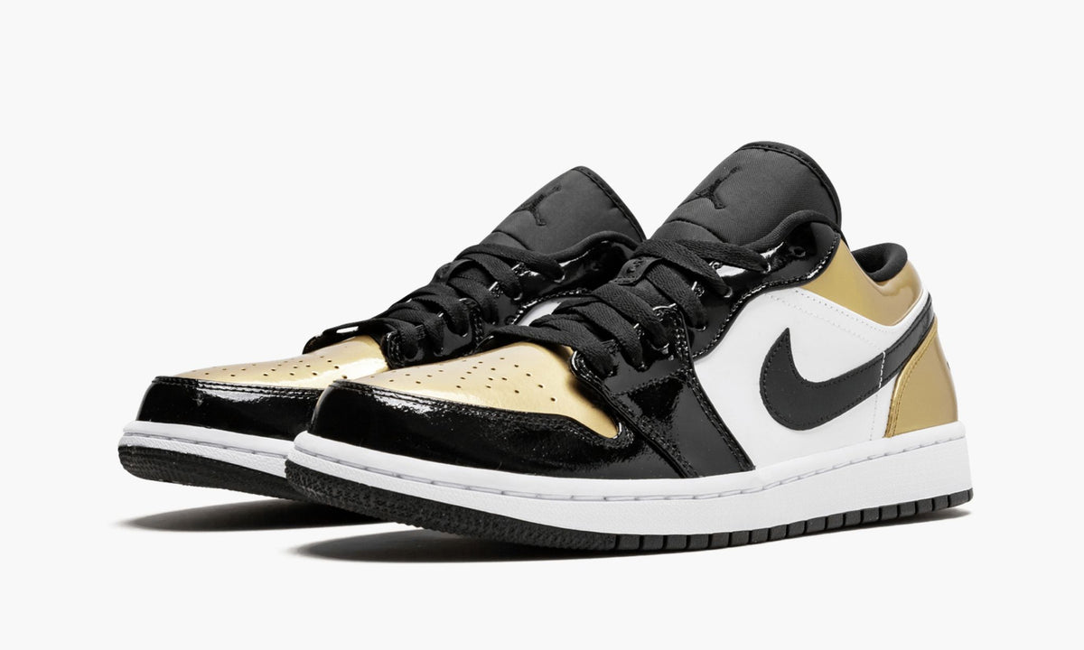 "Gold Toe" Air Jordan 1 Low Sneakers - product image from the listing.