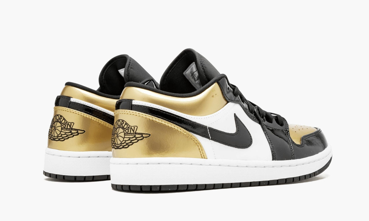 "Gold Toe" Air Jordan 1 Low Sneakers - product image from the listing.