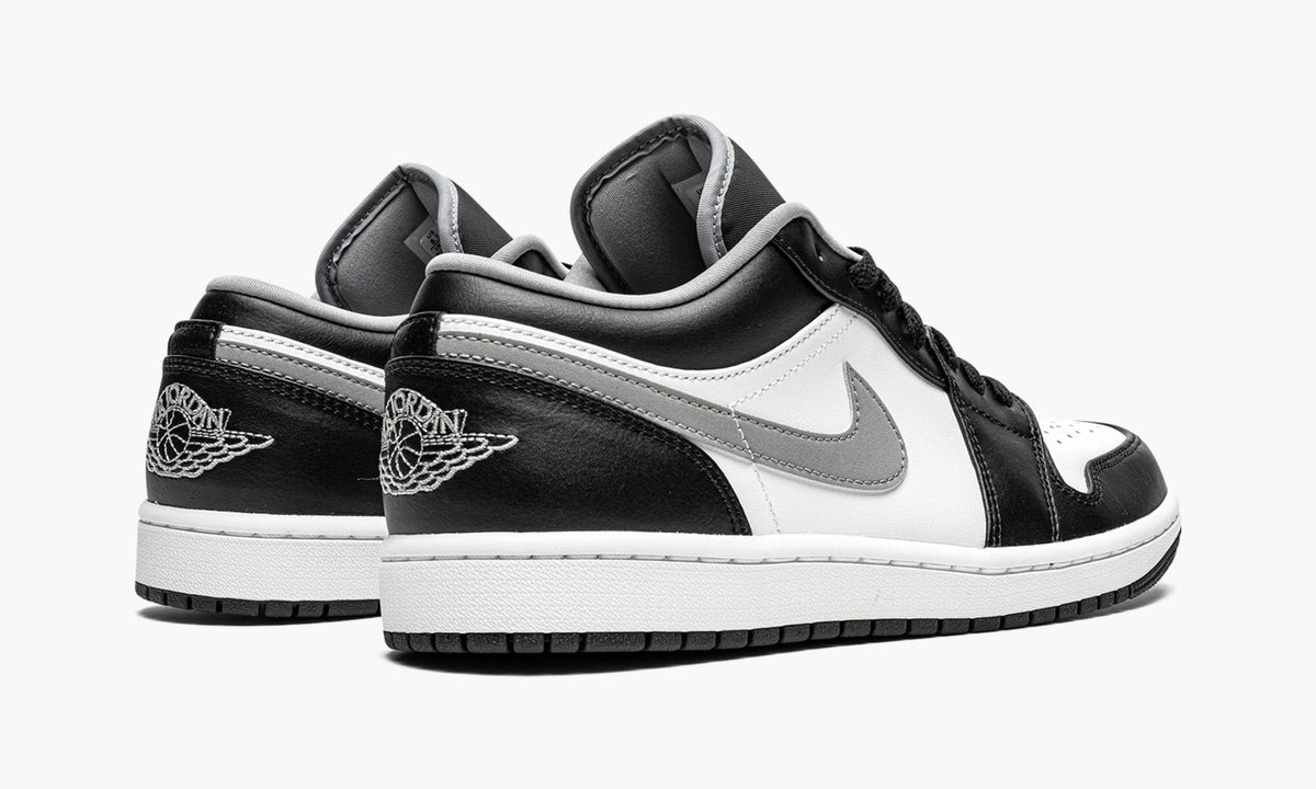 Air Jordan 1 Low Black / Particle Sneakers in Grey - product image from the listing.