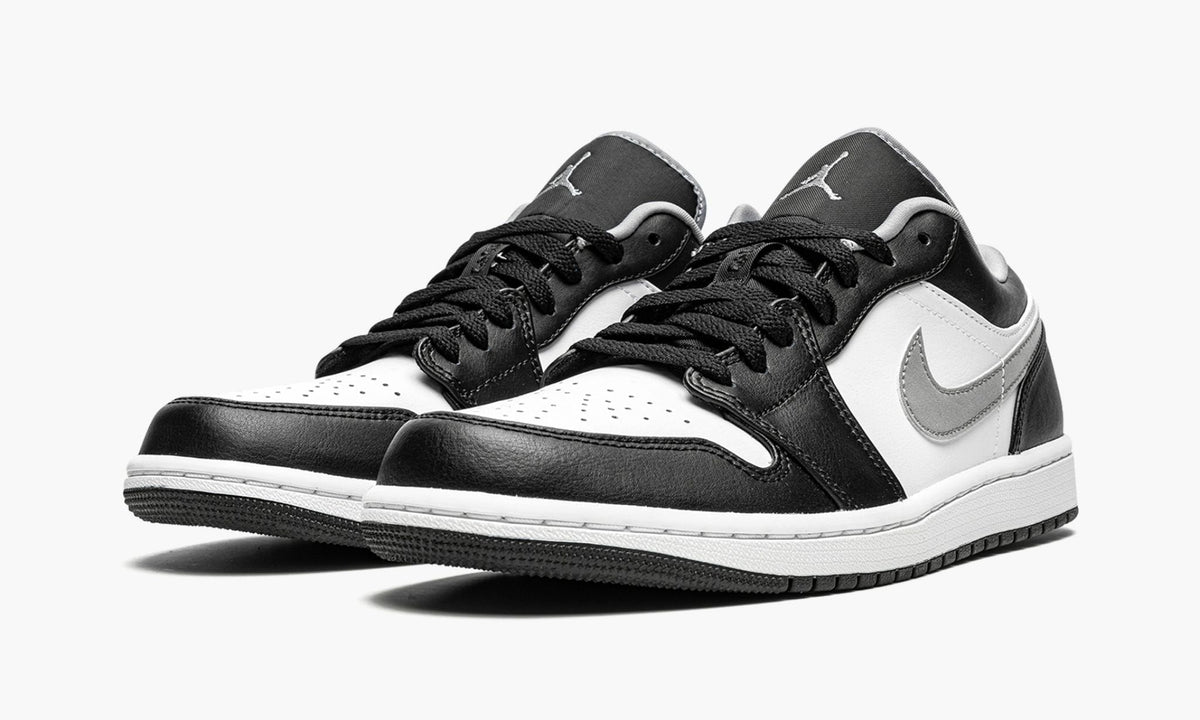 Air Jordan 1 Low Black / Particle Sneakers in Grey - product image from the listing.