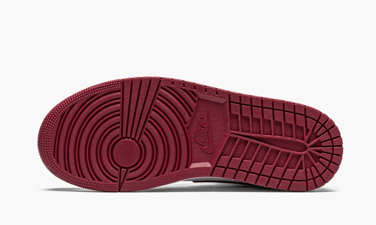 "Bred Toe" Air Jordan 1 Mid Sneakers - product image from the listing.