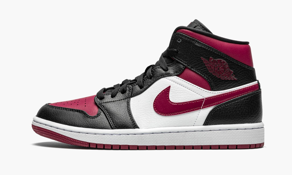 "Bred Toe" Air Jordan 1 Mid Sneakers - product image from the listing.