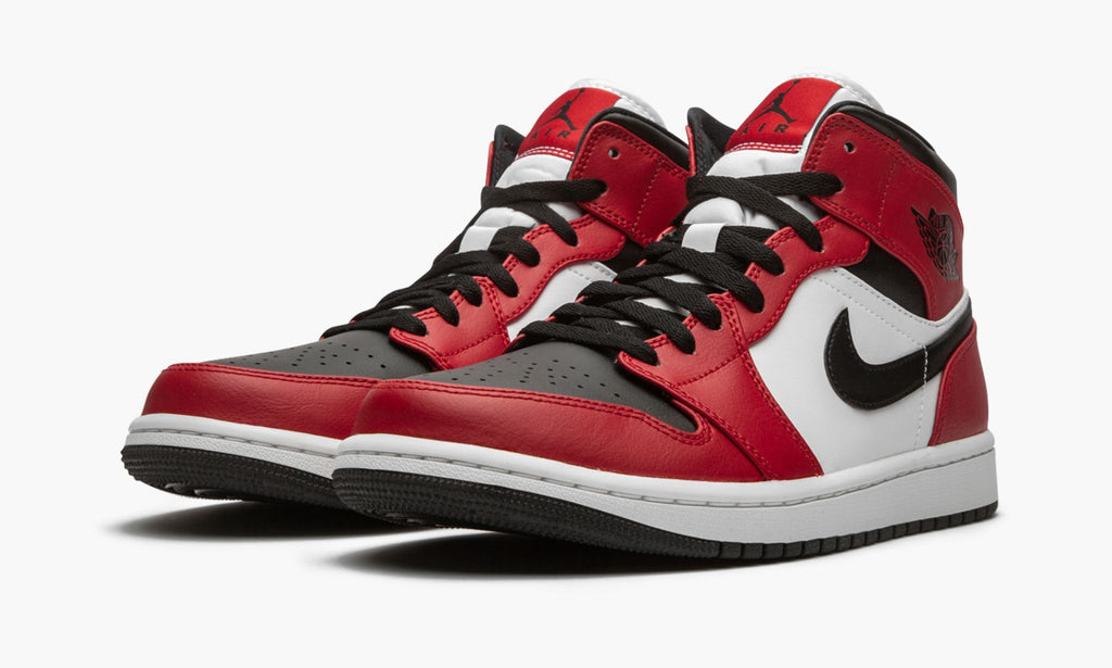 "Chicago Black Toe" Air Jordan 1 Mid Sneakers - product image from the listing.