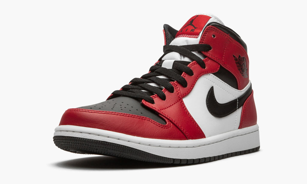 "Chicago Black Toe" Air Jordan 1 Mid Sneakers - product image from the listing.