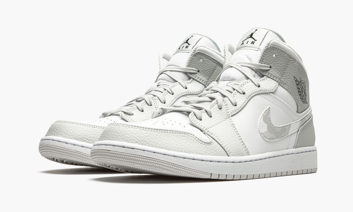 "White Camo" Air Jordan 1 Mid Sneakers - product image from the listing.