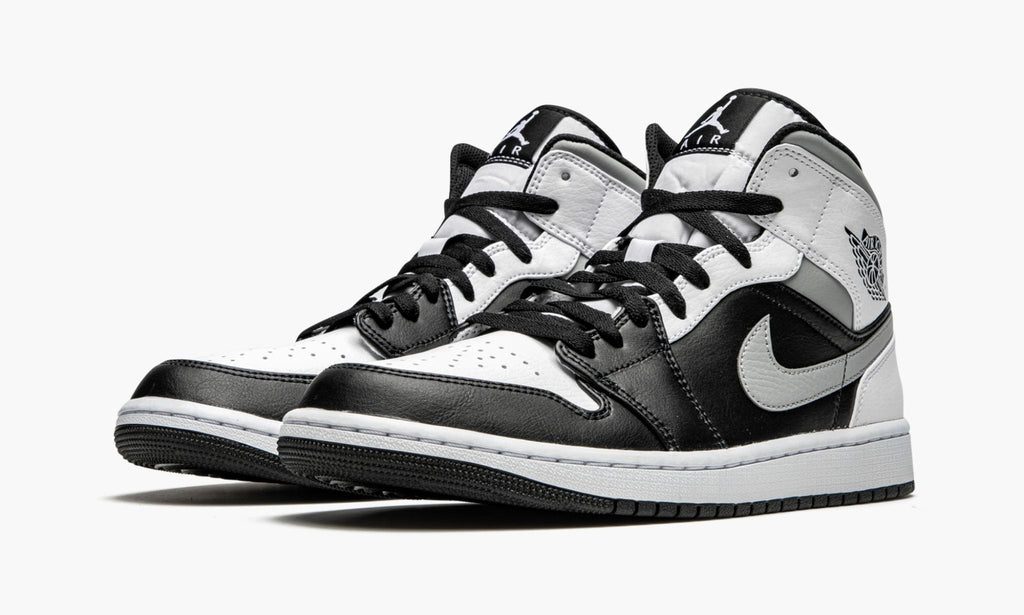 "White Shadow" Air Jordan 1 Mid Sneakers - product image from the listing.