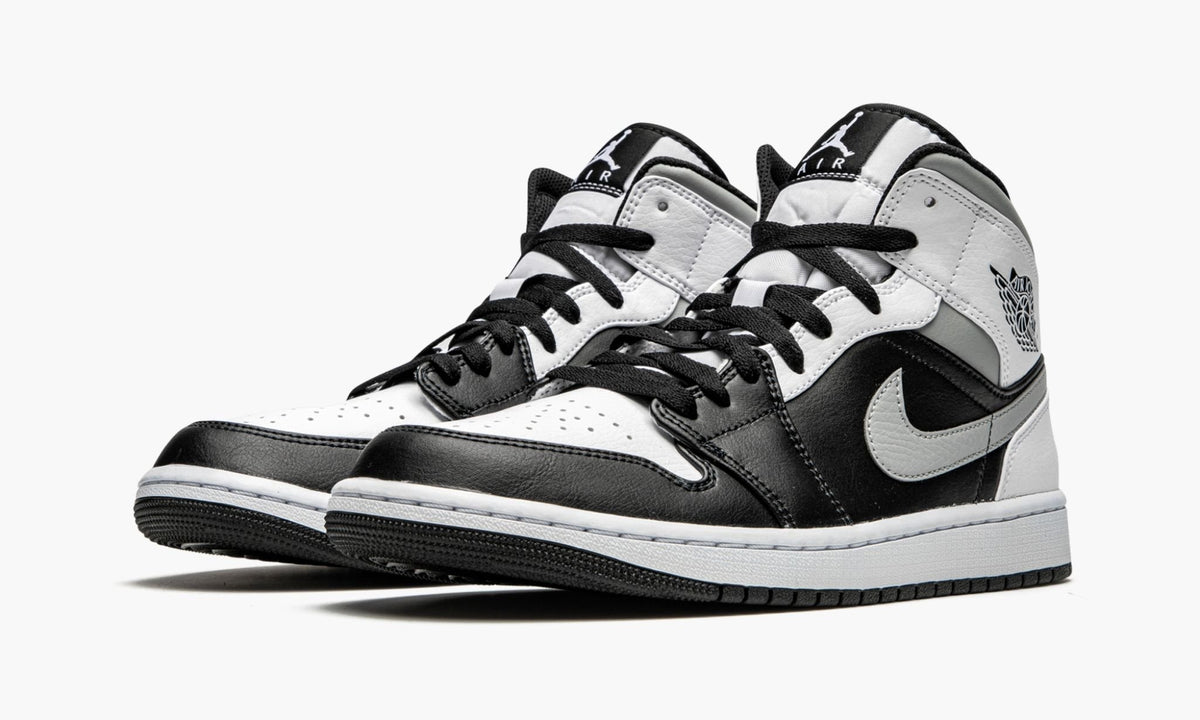 "White Shadow" Air Jordan 1 Mid Sneakers - product image from the listing.