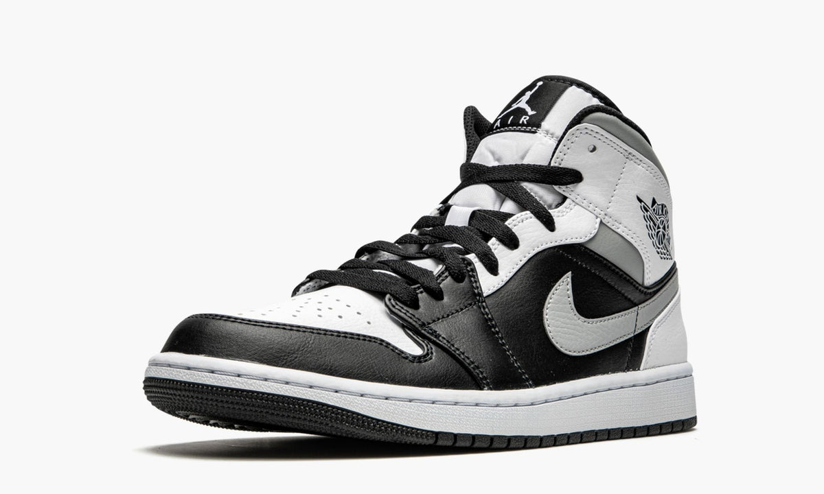 "White Shadow" Air Jordan 1 Mid Sneakers - product image from the listing.