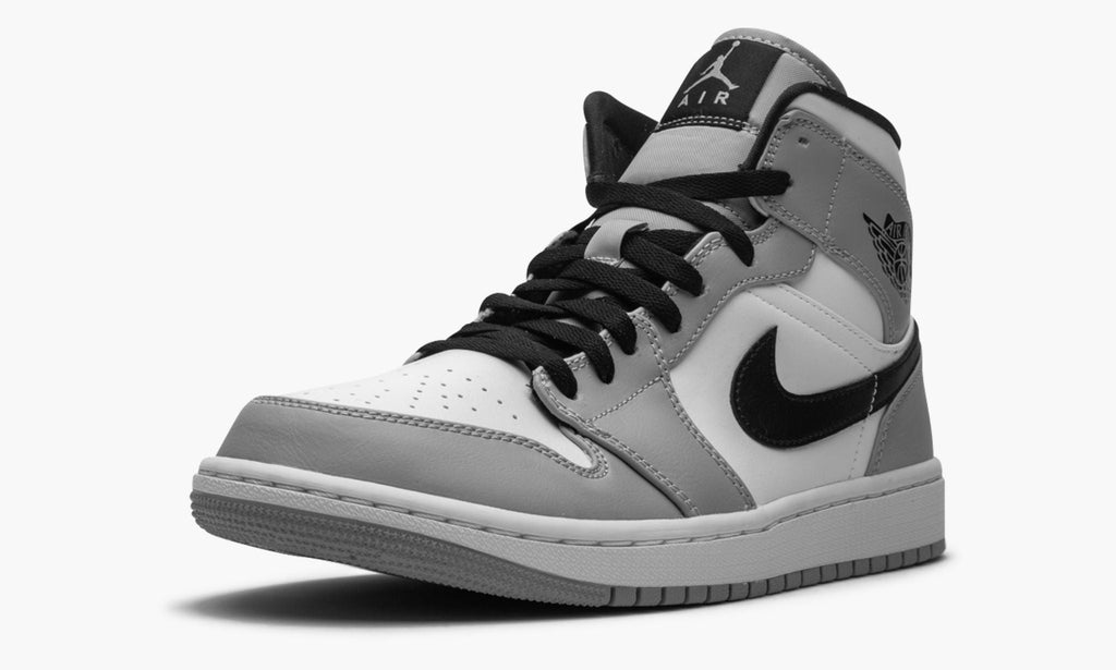 Air Jordan 1 Mid Sneakers in Light Smoke Grey - product image from the listing.