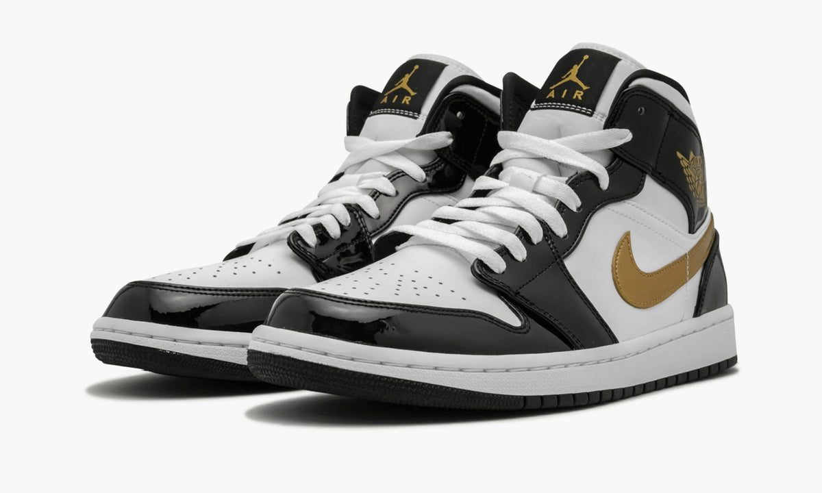 "Black Gold Patent Leather" Air Jordan 1 Mid SE Sneakers - product image from the listing.