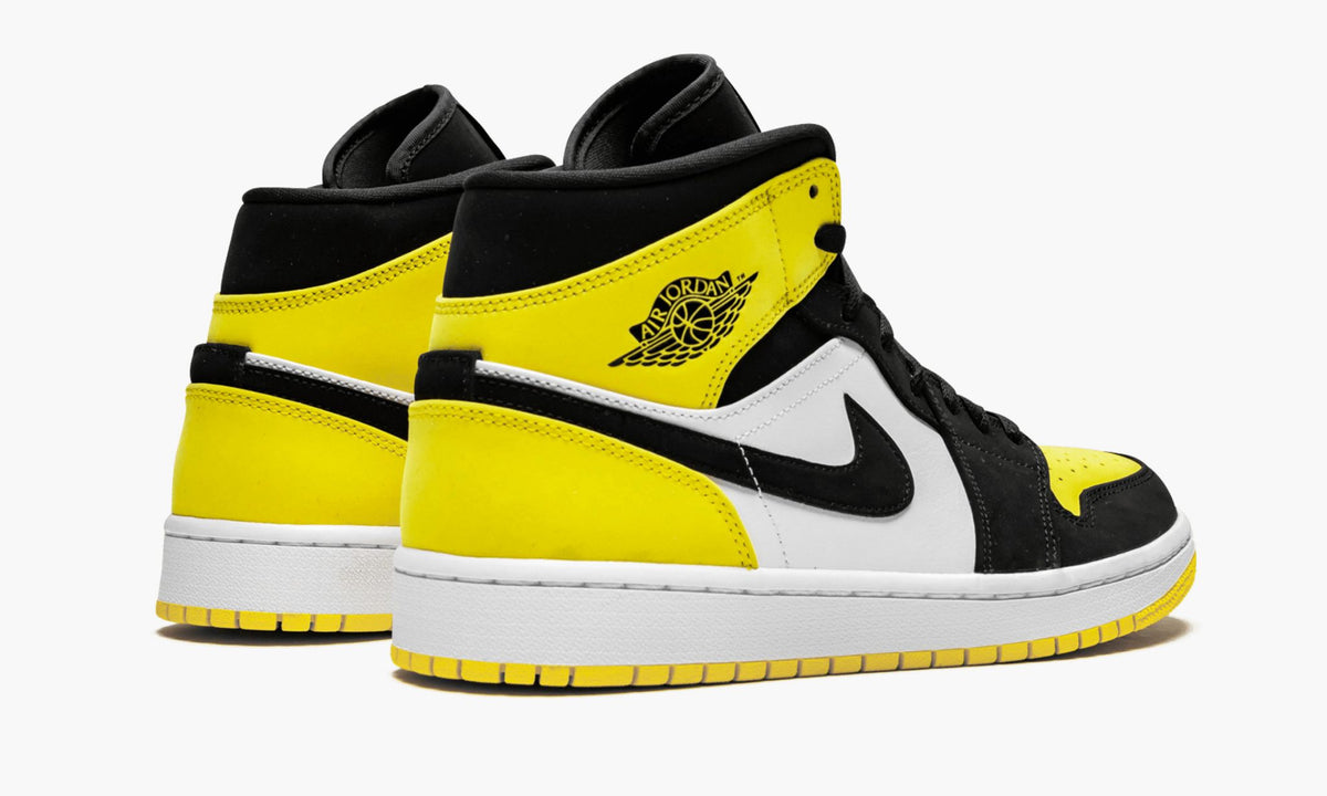 Yellow Toe Sneakers - Air Jordan 1 MID SE - product image from the listing.