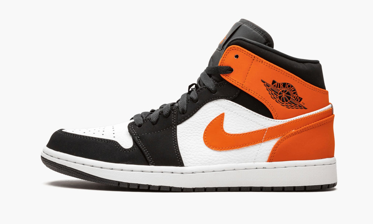 Shattered Backboard Sneakers - Air Jordan 1 Mid - product image from the listing.