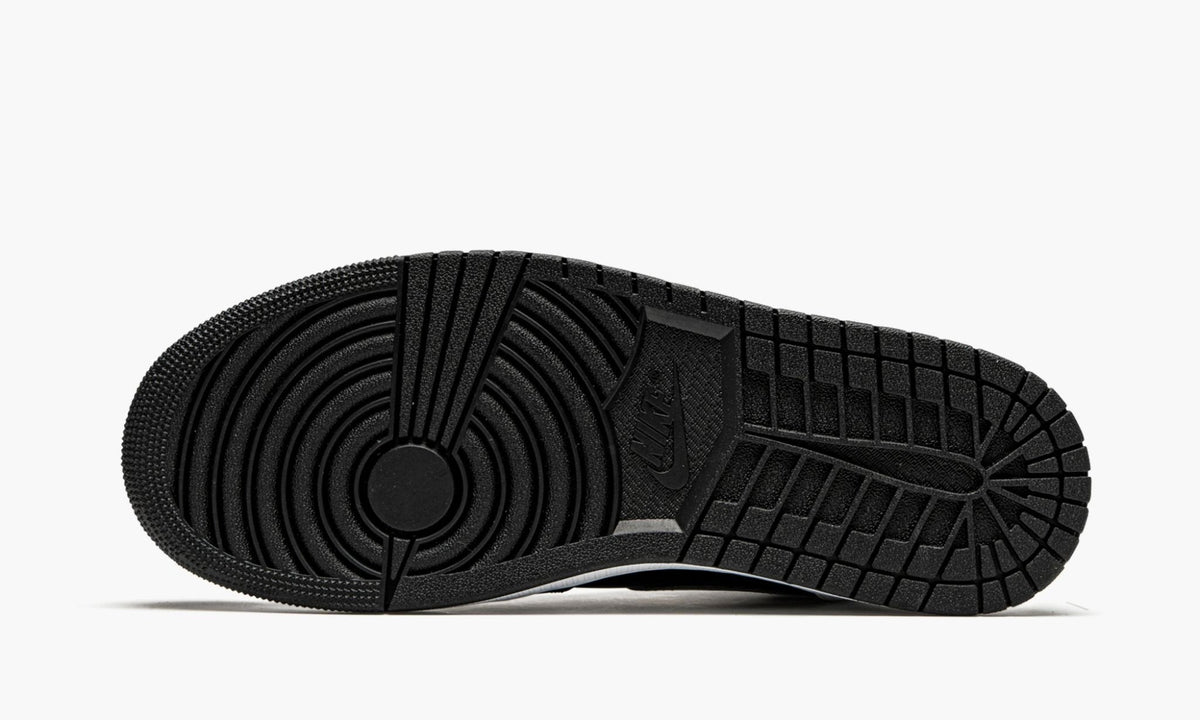 White Shadow Sneakers - Air Jordan 1 Mid - product image from the listing.