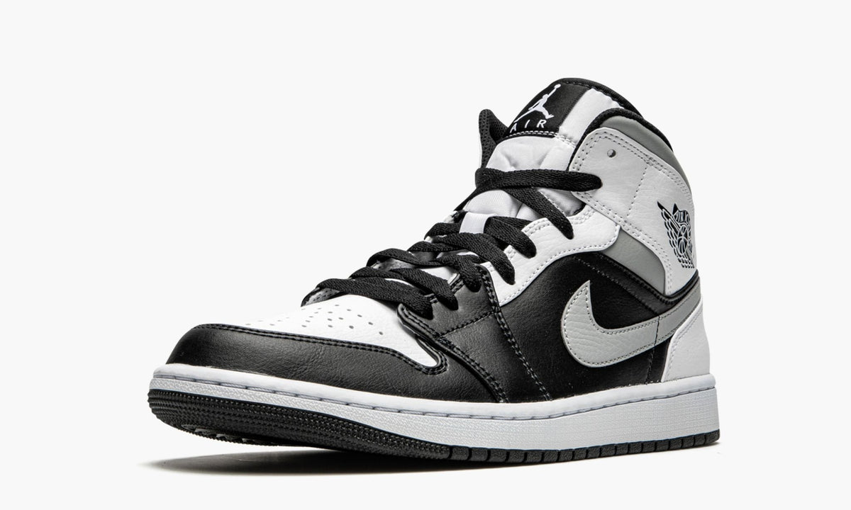 White Shadow Sneakers - Air Jordan 1 Mid - product image from the listing.