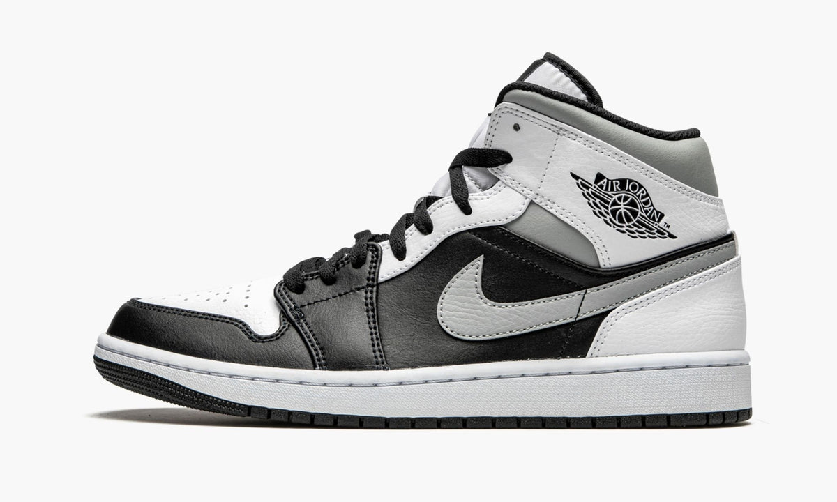 White Shadow Sneakers - Air Jordan 1 Mid - product image from the listing.