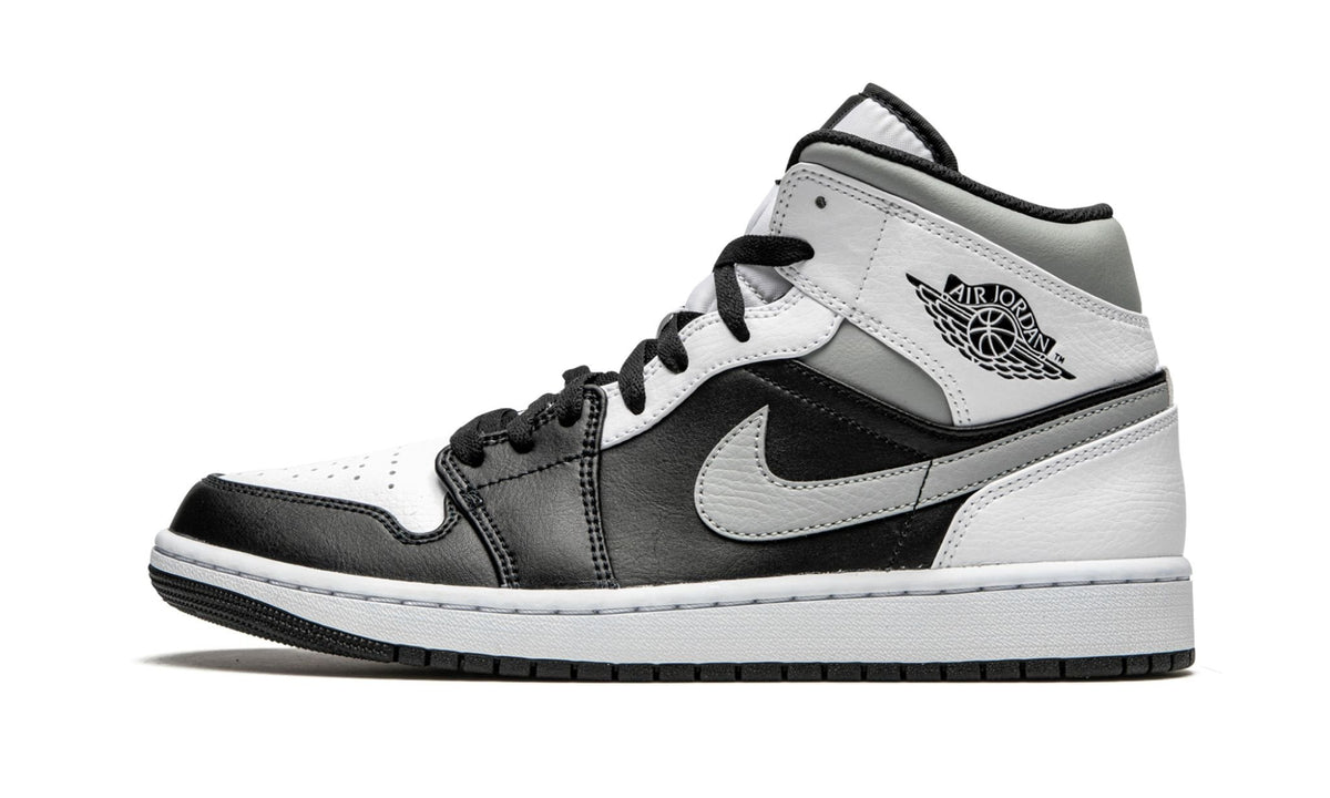 White Shadow Sneakers - Air Jordan 1 Mid - product image from the listing.