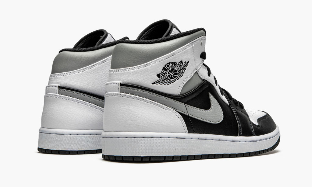 White Shadow Sneakers - Air Jordan 1 Mid - product image from the listing.