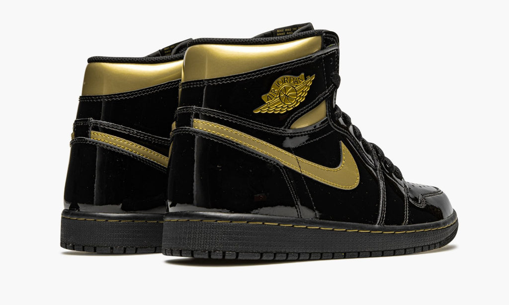 "Black Metallic Gold" Air Jordan 1 Retro High OG Sneakers - product image from the listing.