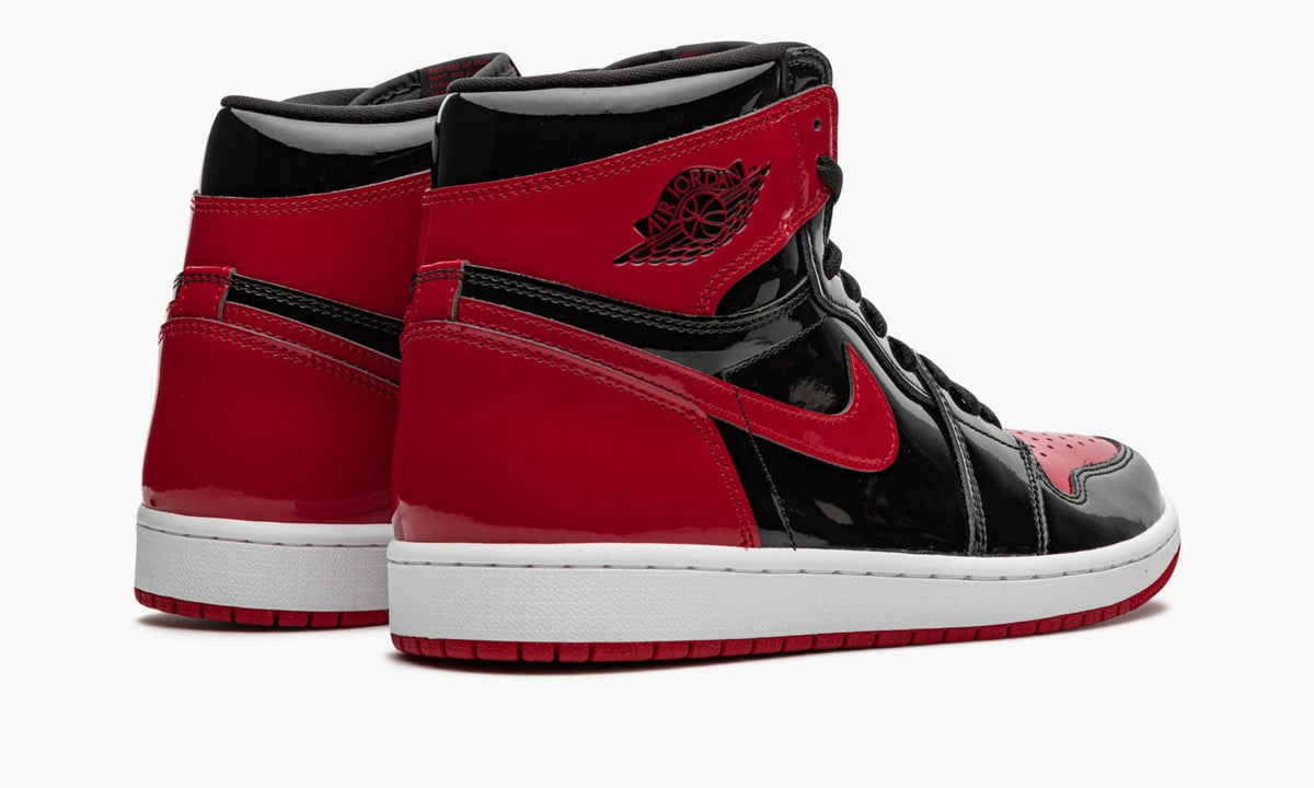 "Bred Patent" Air Jordan 1 Retro High OG Sneakers - product image from the listing.