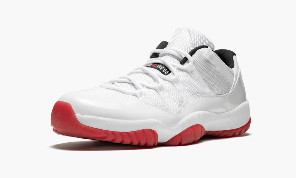 Air Jordan 11 Retro Low White/Varsity Sneakers in Red - product image from the listing.
