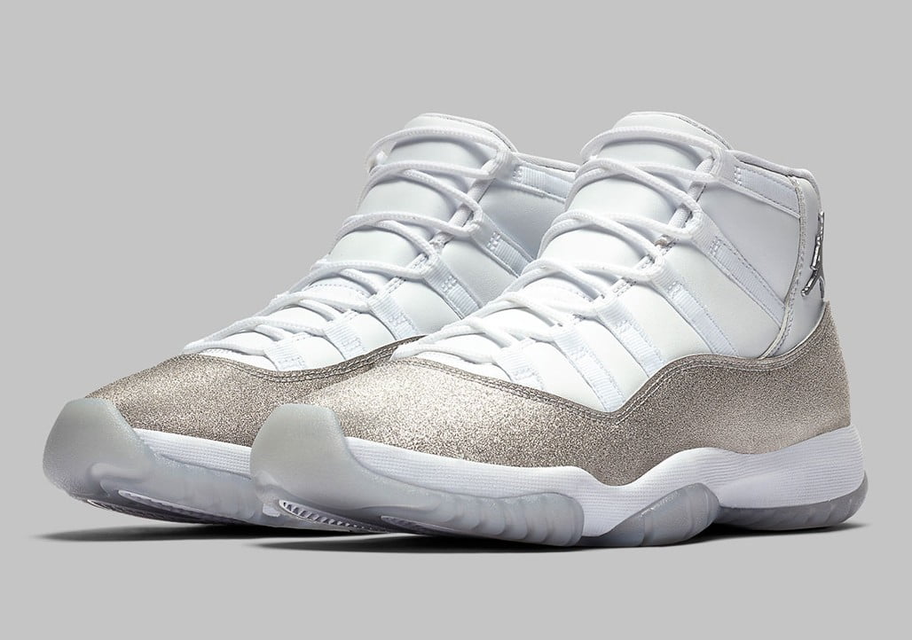 Women's Air Jordan 11 Retro White Metallic Silver Sneakers - product image from the listing.
