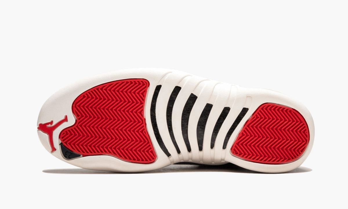 "International Flight" Air Jordan 12 Retro PRM Sneakers - product image from the listing.