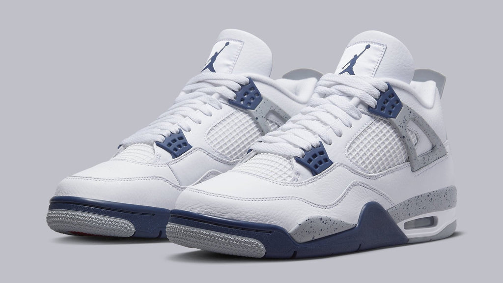 Air Jordan 4 Retro Sneakers in White Midnight Navy - product image from the listing.