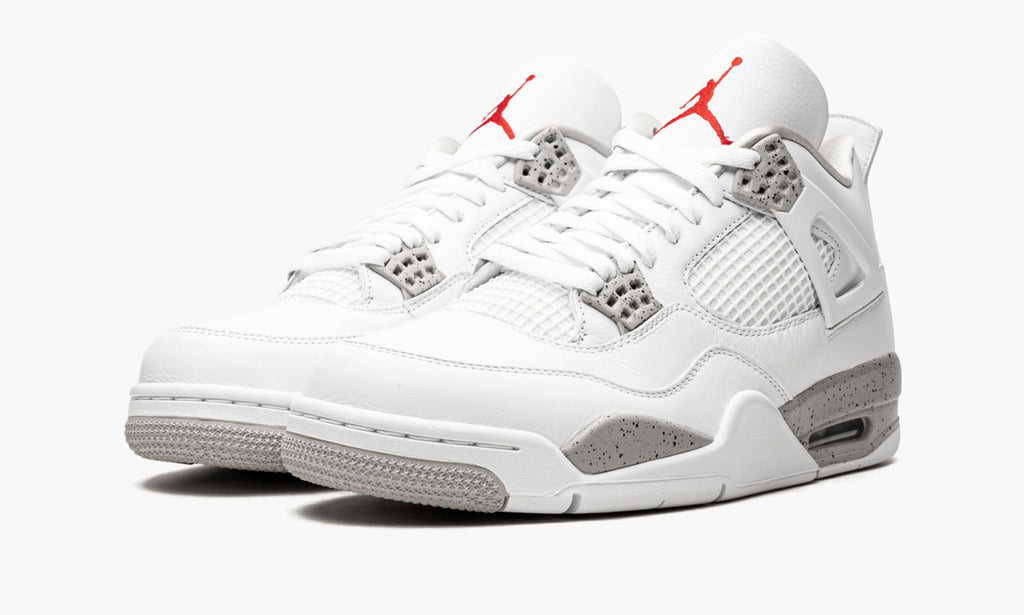 White Oreo Sneakers - Air Jordan 4 Retro - product image from the listing.