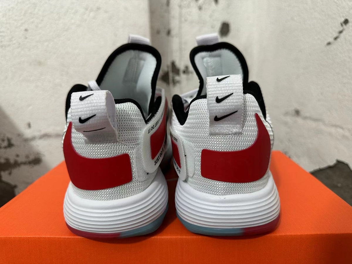 Nike White and Red Basketball Trainers with Strap - product image from the listing.