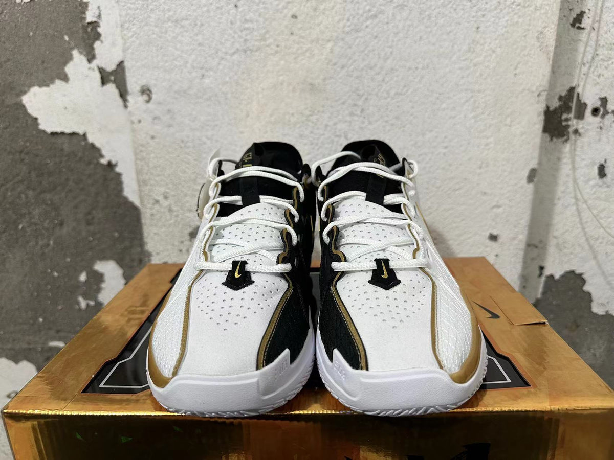 Nike GT Cut 3 Basketball Shoes in White Black Gold - product image from the listing.