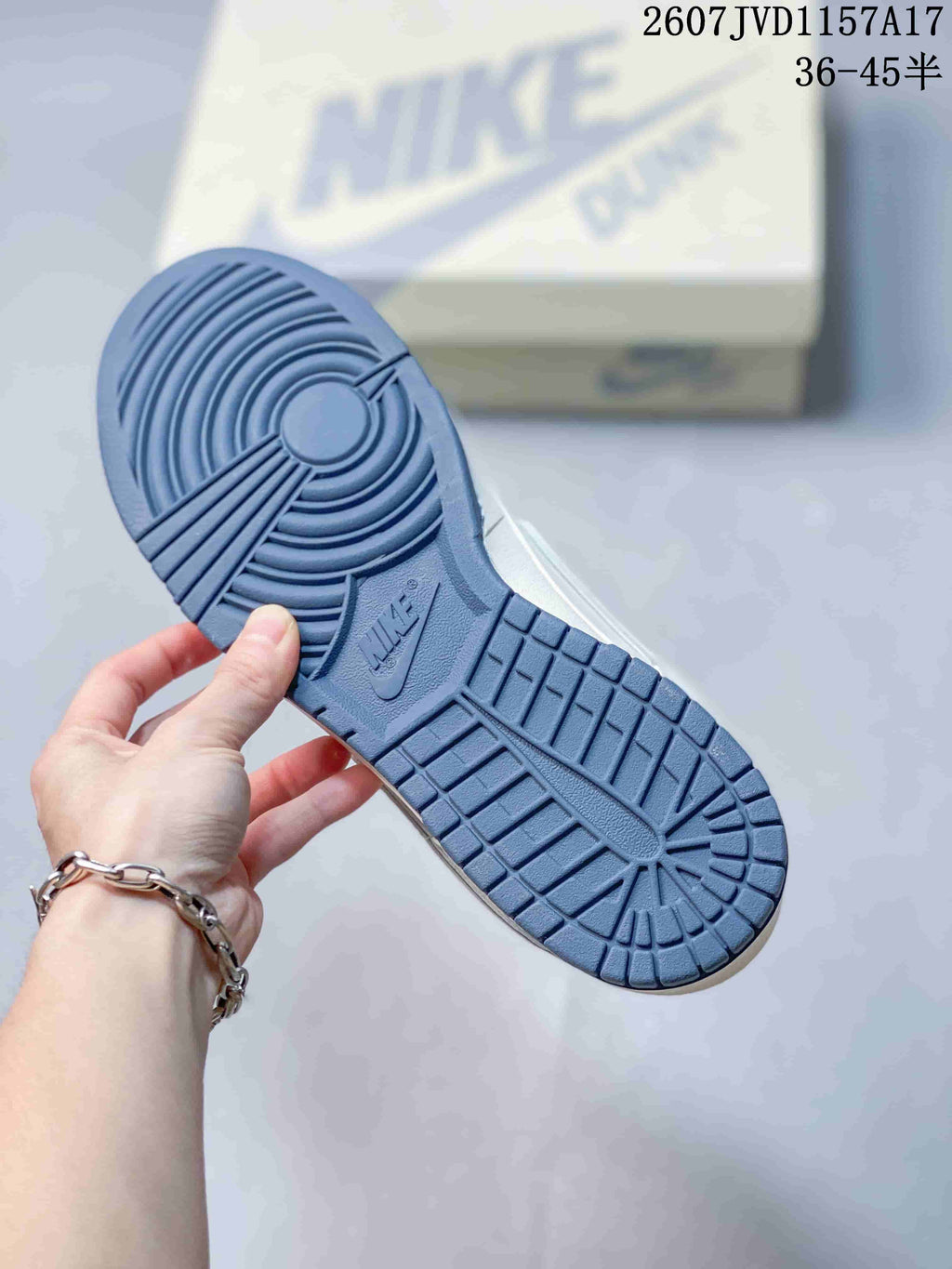 Louis Vuitton x Nike Dunk Low Sneakers in White Blue - product image from the listing.