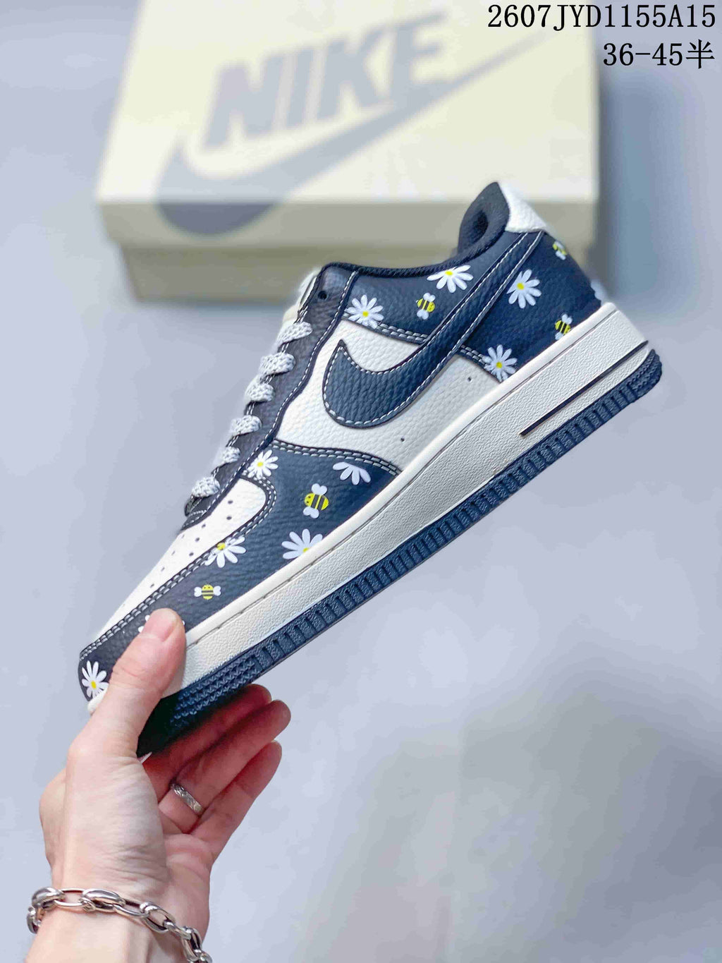 Nike Air Force 1 Low Sneakers Navy Floral in White 2607JYD1155A15 - product image from the listing.