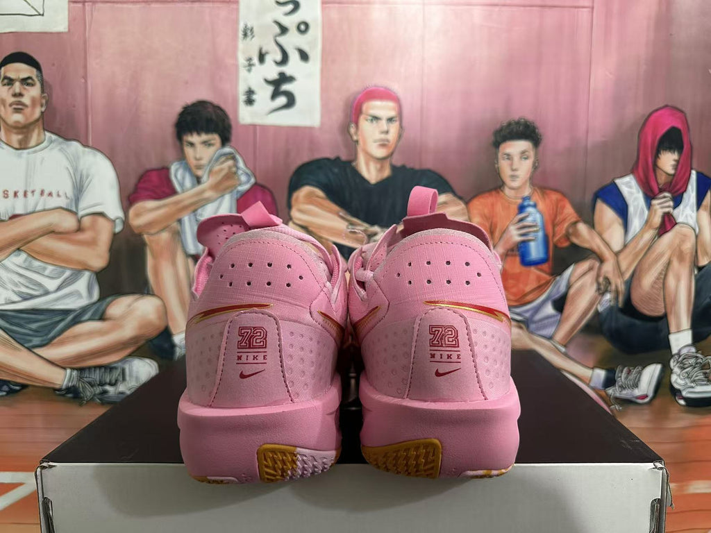 Pink and Gold Nike Basketball Shoes - product image from the listing.