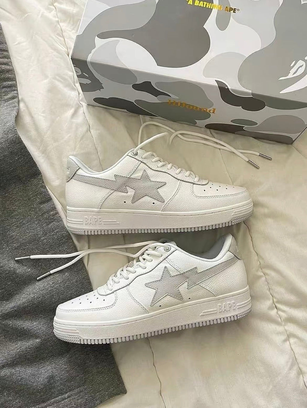 White and Grey BAPE STA Low Sneakers - product image from the listing.