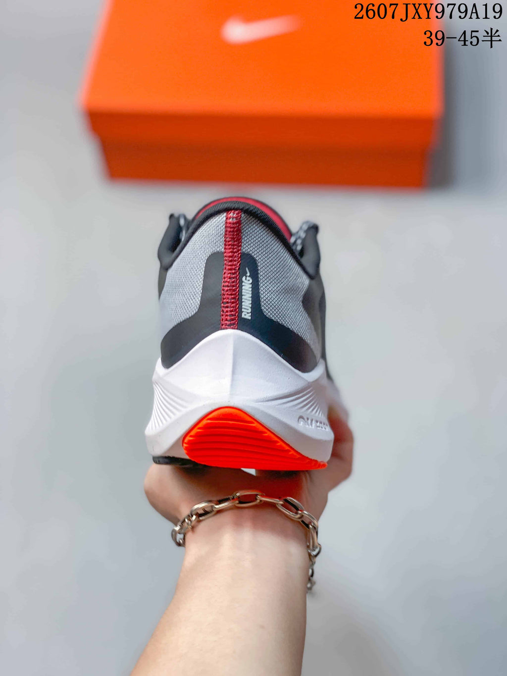 Nike Zoom Winflo 7 Running Shoes in Dark Gray Orange 07JXY979A19 - product image from the listing.
