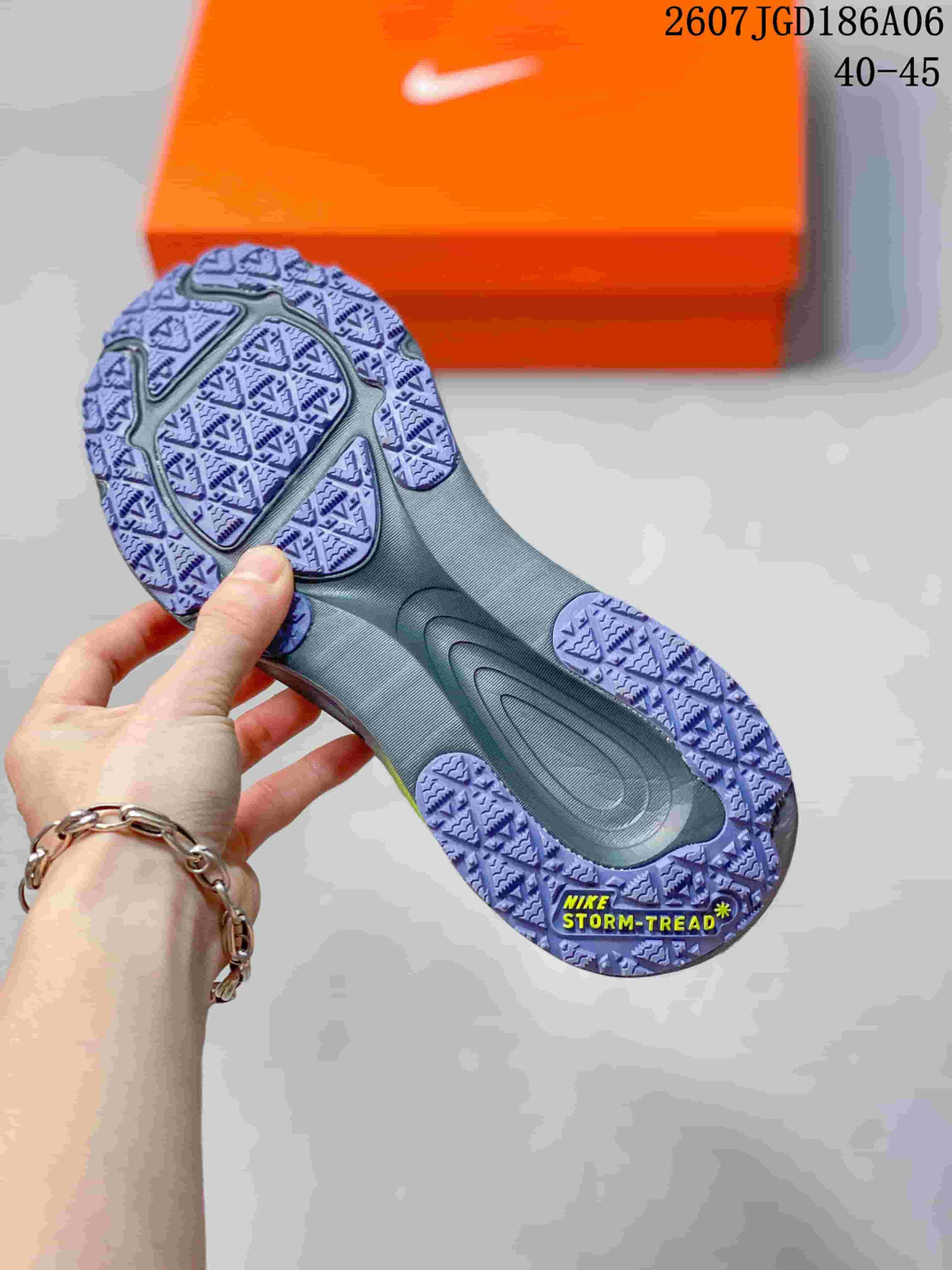 Nike Vomero Plus Run Running Sneakers in Gray - product image from the listing.