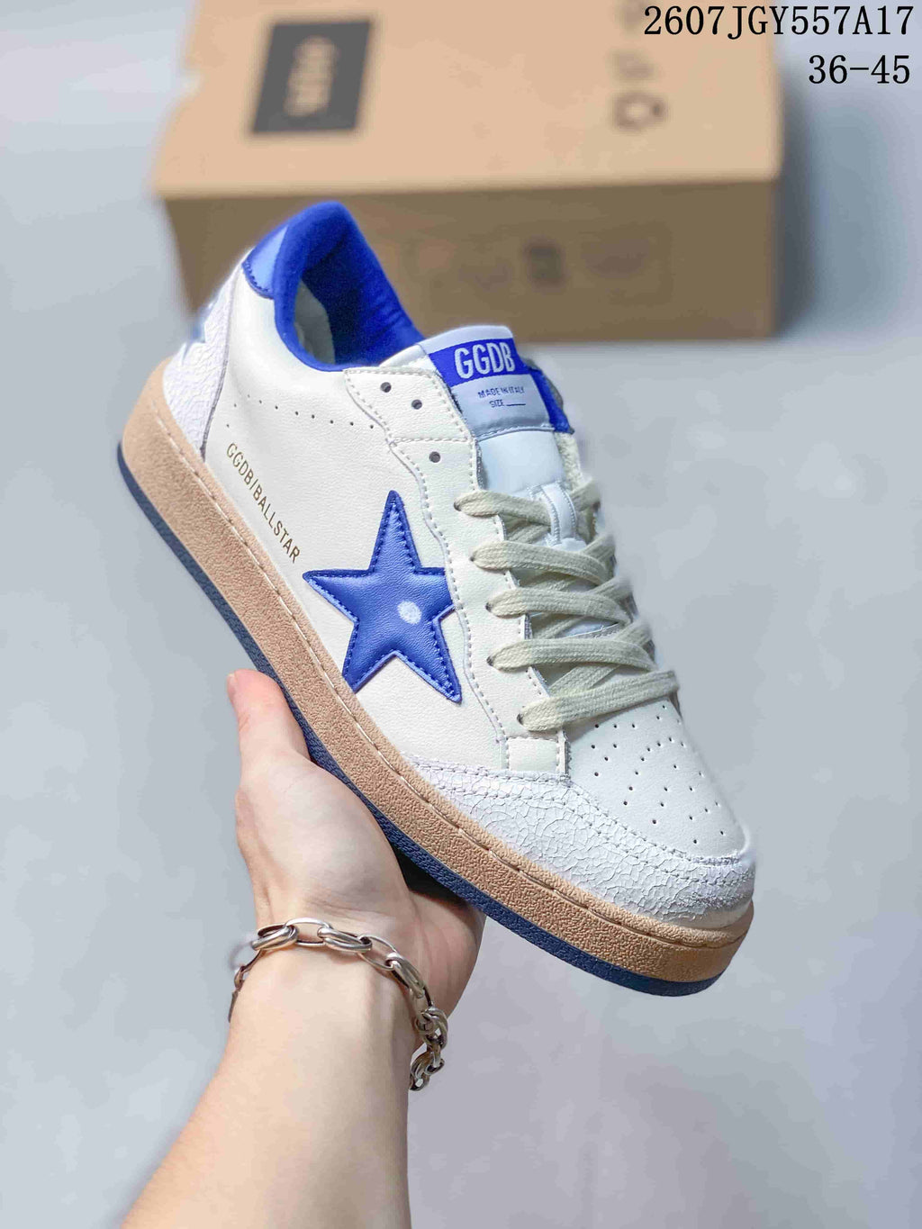 Golden Goose Ball Star Low-Top Sneakers in White and Blue 2607JGY557A17 - product image from the listing.