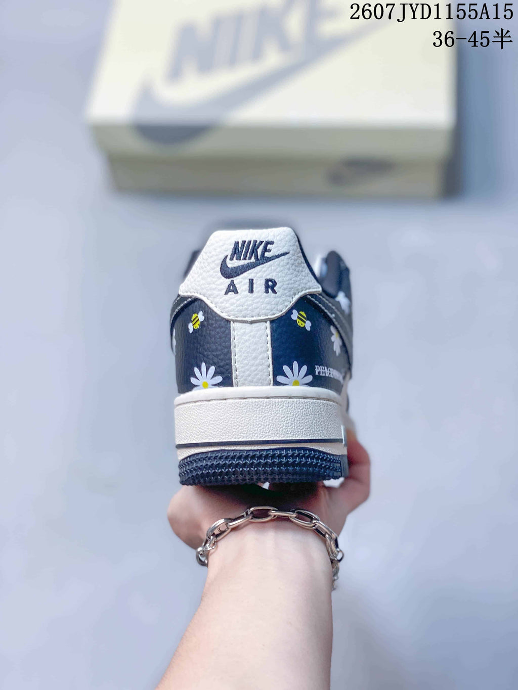 Nike Air Force 1 Low Sneakers Navy Floral in White 2607JYD1155A15 - product image from the listing.
