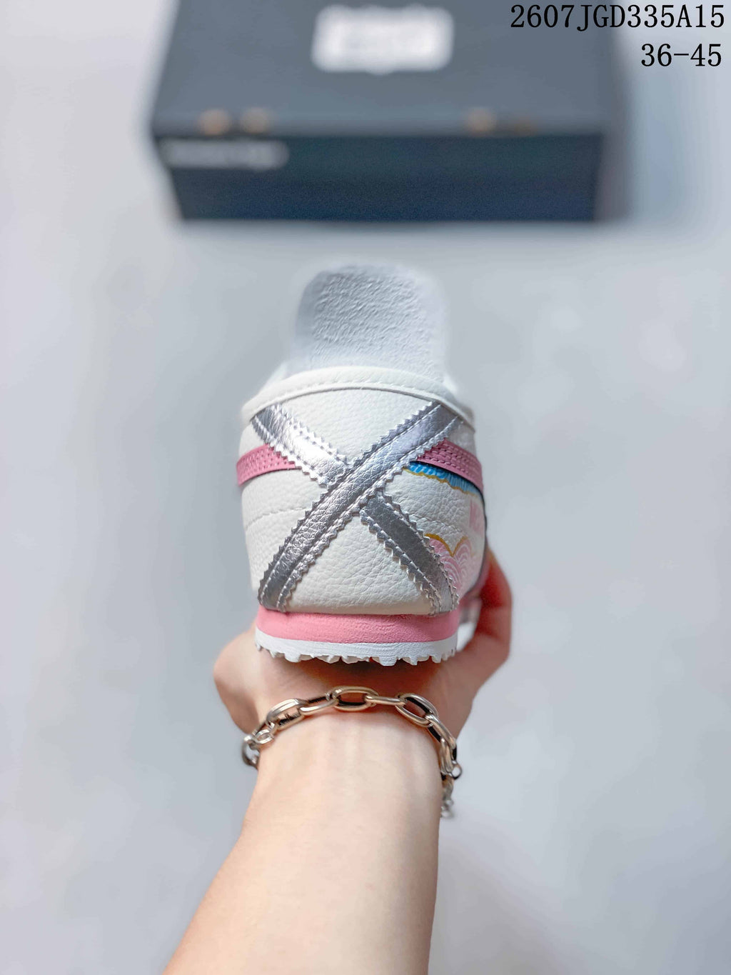Onitsuka Tiger Mexico 66 Deluxe Sneakers in White Pink 2607JGD335A15 - product image from the listing.