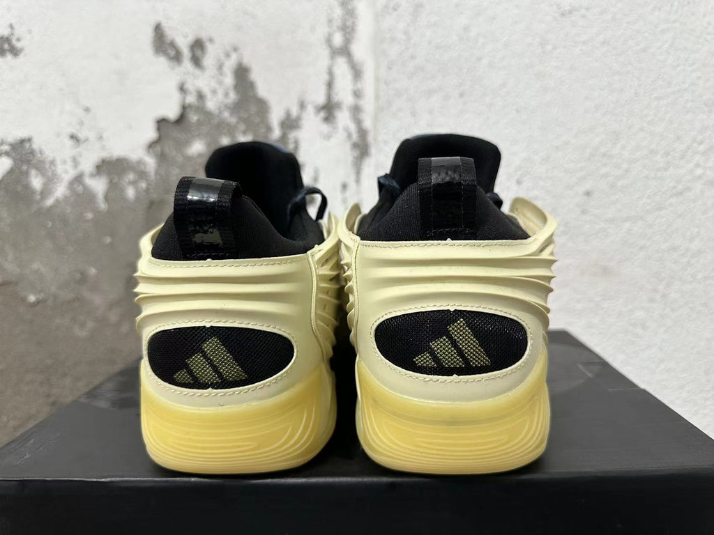 Adidas Basketball Sneakers in Cream, Yellow, in Navy and Black - product image from the listing.