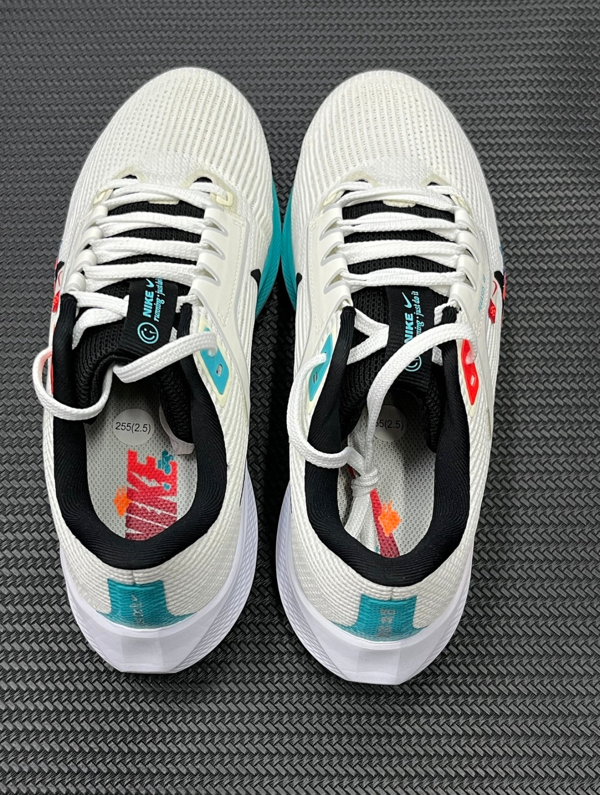 Nike Air Zoom Pegasus 40 Running Shoes in White Multicolor FZ5055-101 - product image from the listing.