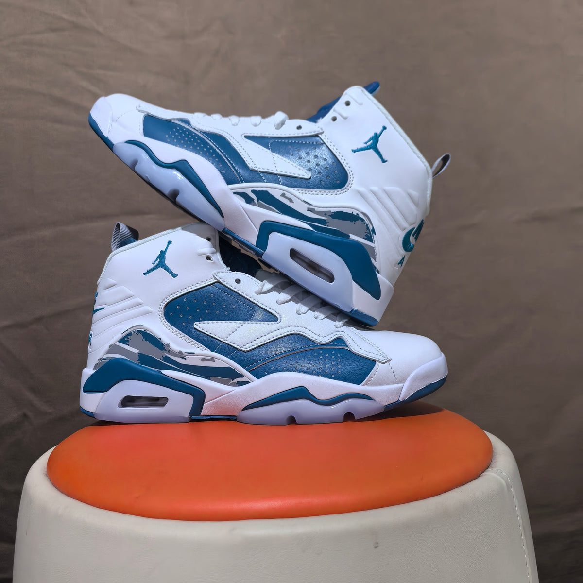 Jordan 6 Retro High-Top Sneakers in White and Blue - product image from the listing.