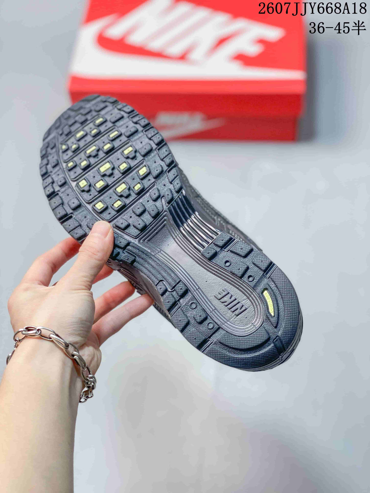 Nike P-6000 Sneakers Dark Gray Neon in Green - product image from the listing.