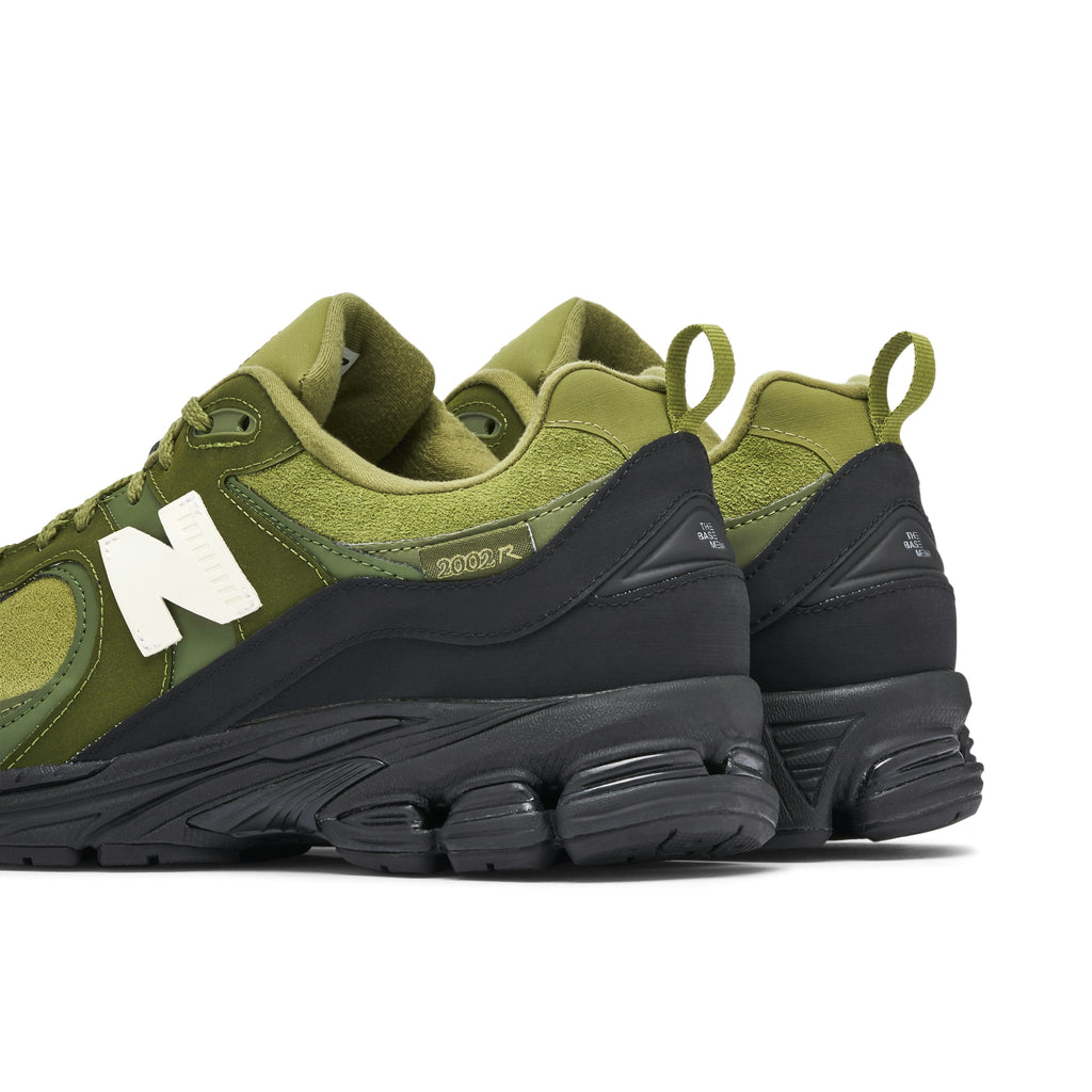 NEW BALANCE 2002R X THE BASEMENT in OLIVE BLACK - product image from the listing.