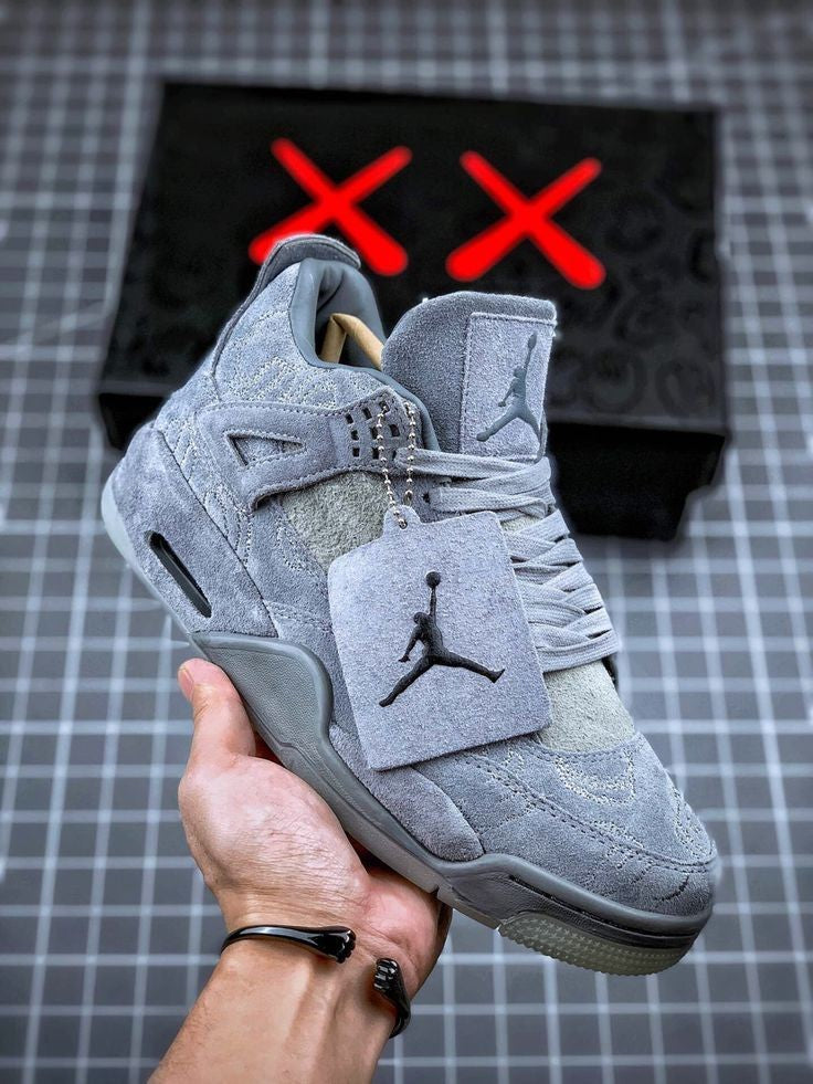 Air Jordan 4 Retro KAWS x 'Cool Grey' - product image from the listing.